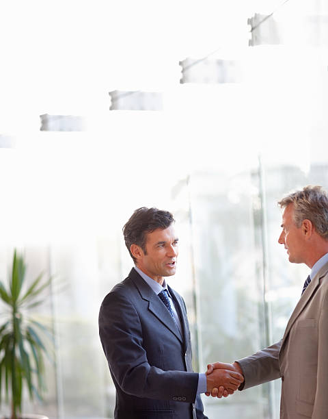 istock Business colleagues shaking hands 157434254