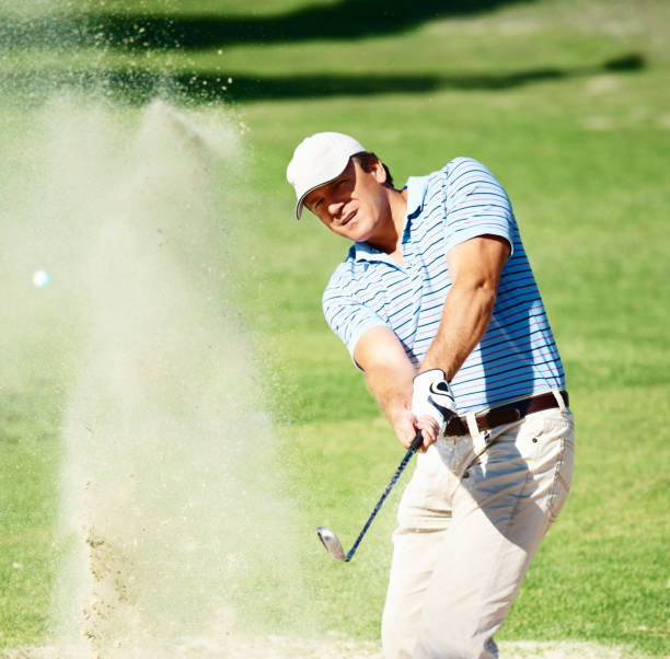 istock Golfer clearing a sand trap 157434261