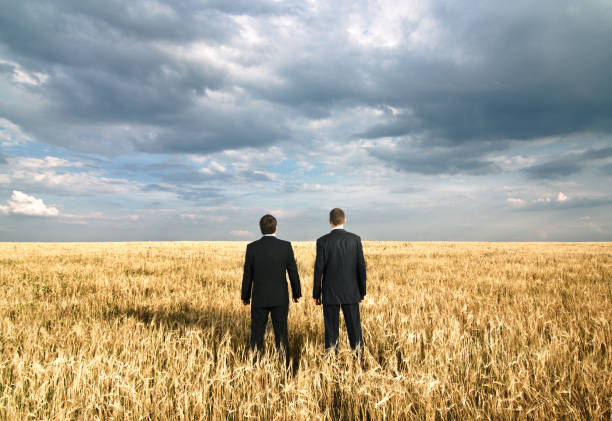 istock Two Businessmen in the Field 157434375