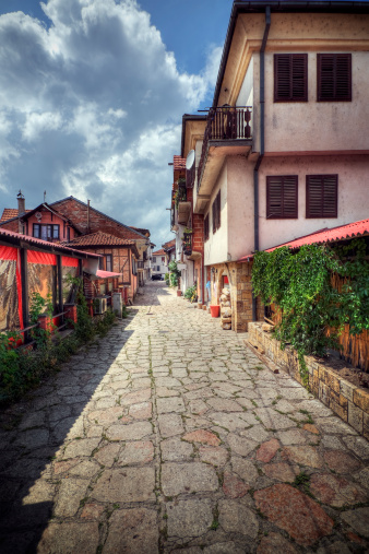 Cobblestone alleyway in the Macedonian resort town of Struga. High dynamic range photo. 