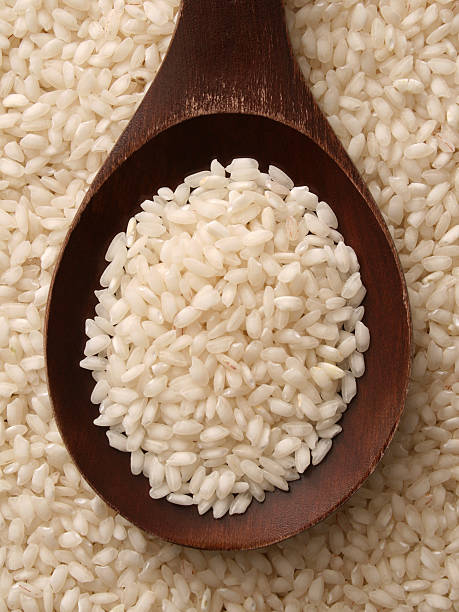arroz arborio - arroz arborio fotografías e imágenes de stock
