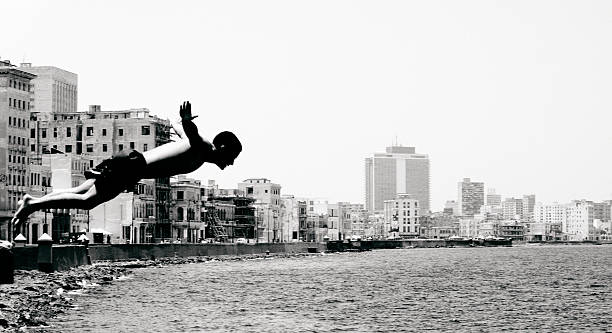 havana jump man jumping into sea. cuba photos stock pictures, royalty-free photos & images