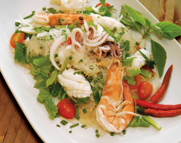 Extremely popular Thai dish! Hot, spicy and so nice (called also Yam Moo Sen)! More Thai food below: