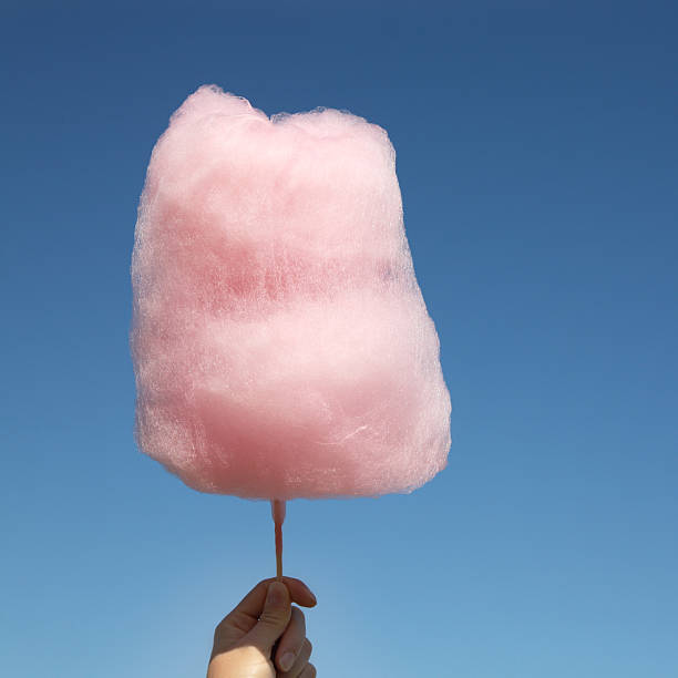 istock Cute, pink, sweet cotton candy above the sky  157435067