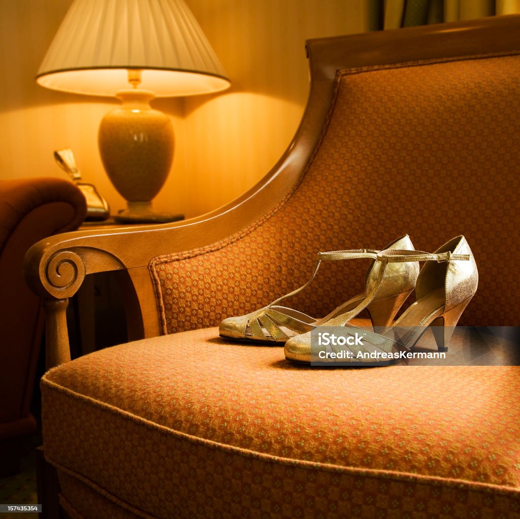 golden shoes  Armchair Stock Photo