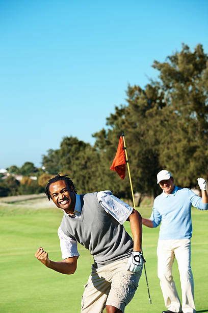 istock African American golfer with clenched fist 157435548