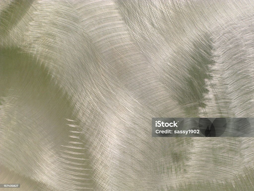 Stainless Steel Brushed Background Close up of a brushed stainless steel plate. Textured Stock Photo