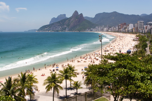 Overview of Ipanema Beach stretching until Leblon and Two Brothers mountain. Rio de Janeiro, Brazil.