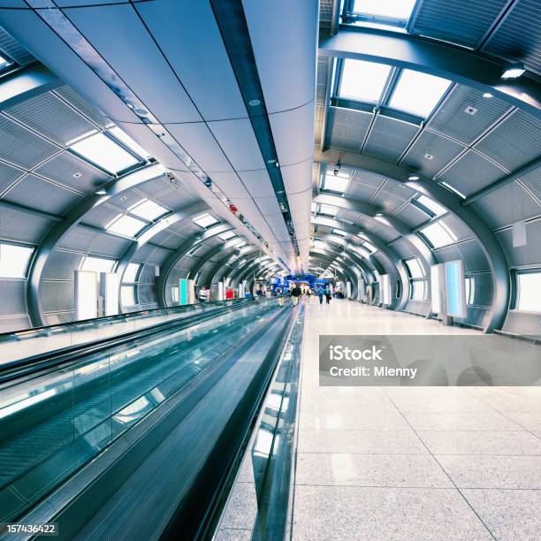 Futuristic Airport Walkway Tunnel Stock Photo - Download Image Now - People, Airport, Architecture