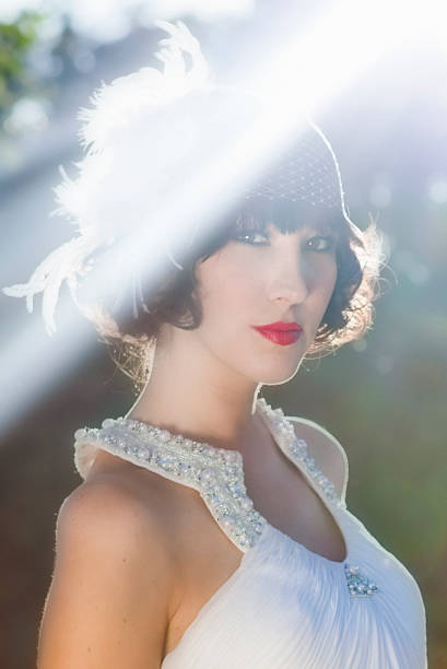 istock 20s style portrait with large ray of sun 157436524