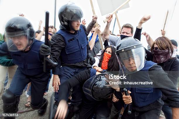 Riot Police Fight Angry Mob Stock Photo - Download Image Now - Riot, Police Force, Protest