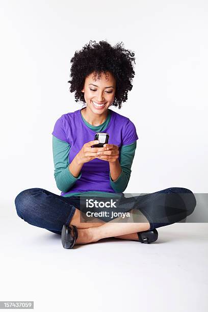 Pretty Girl Text Messaging Stock Photo - Download Image Now - African Ethnicity, White Background, Women