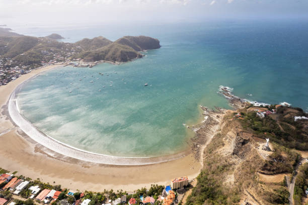 Seascape in central america with bay blue water above top drone aerial view