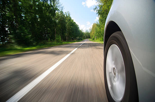 istock view from side of fast moving car 157437374