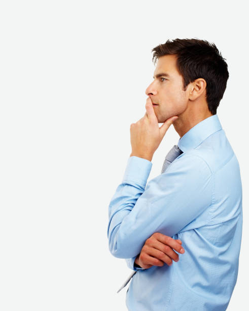 istock Side profile of a young businessman contemplating 157437481