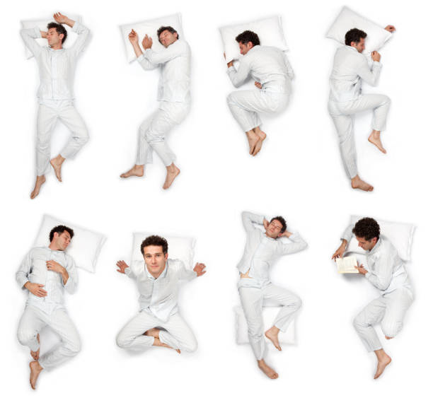 istock composition of sleep pose beautiful young man with pajamas isolated 157437547