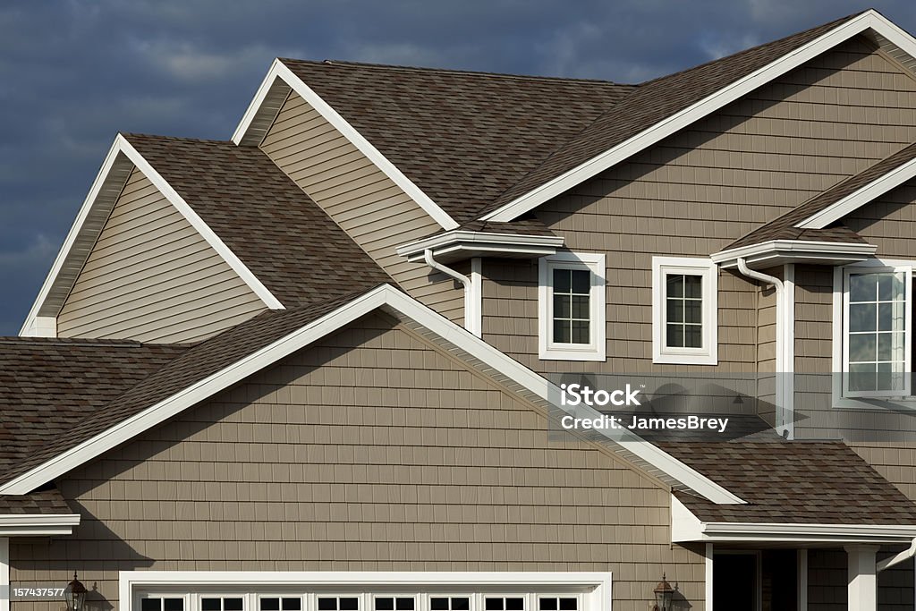 New Home, Vinyl Siding, Architectural Asphalt Shingle Roof, Real Estate  Rooftop Stock Photo