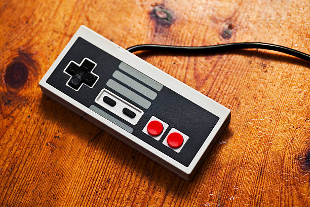 Retro Game Console controller Retro Game Console controller computer game control stock pictures, royalty-free photos & images