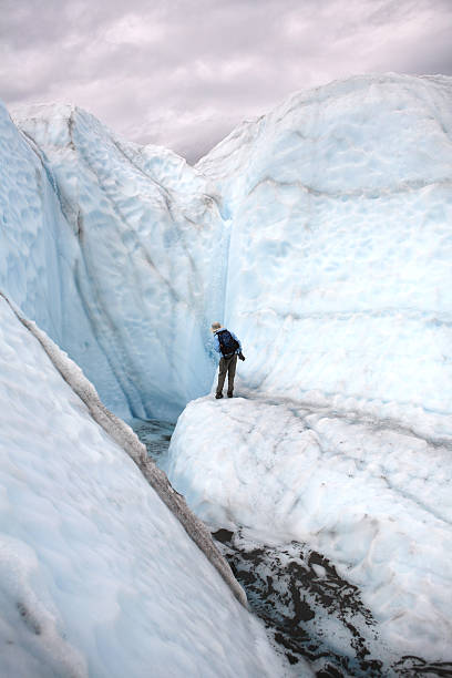 istock woman on a glacier 157437815