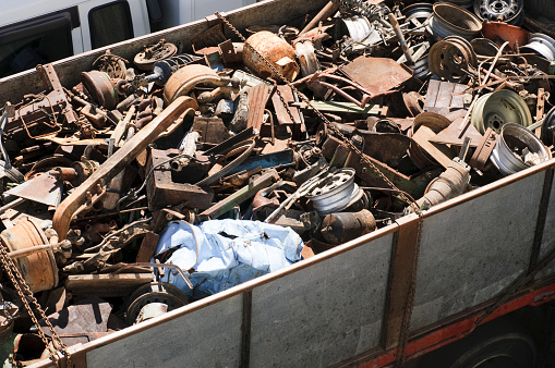 Scrap metal sits in a heap.