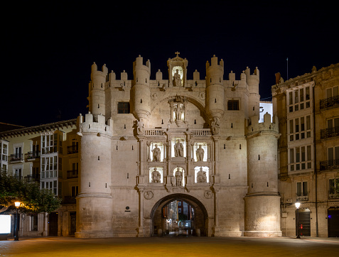 Medieval and monumental arch of Santa Maria in the historic city of Burgos, Castilla y Leon, Spain at night