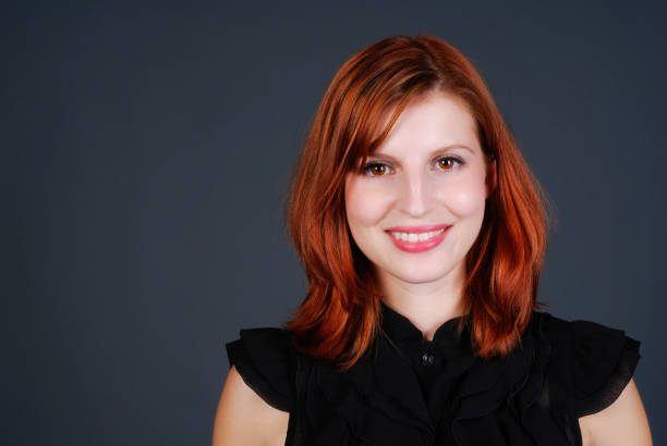 istock Smiling Red Headed Woman 157437977