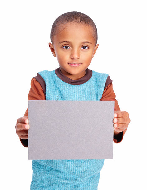 istock Portrait of a boy holding placard 157438324
