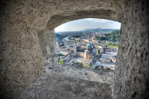 Looking out a window onto an old European city. High dynamic range photo. Photo taken in Salzburg Austria.