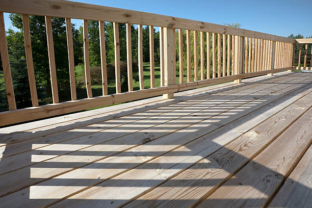 istock Wooden Deck Patio Surface, Pine Floor With Railing, Sun, Shadow 157438621