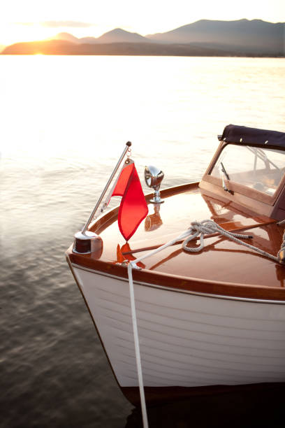 istock Wooden boat at anchor during sunset 157438869