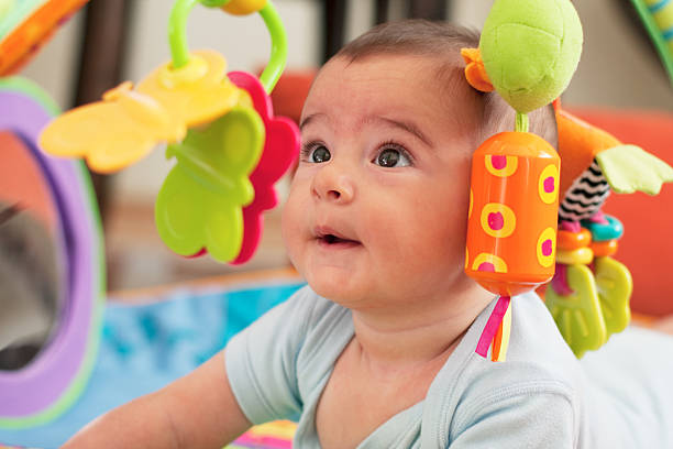 istock Five months old baby girl is playing 157439083