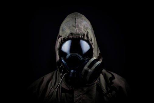 US military soldier in official chemical warfare gear