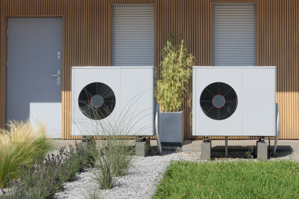istock Eco-Friendly Air Source Heat Pump at New Home 1574393001
