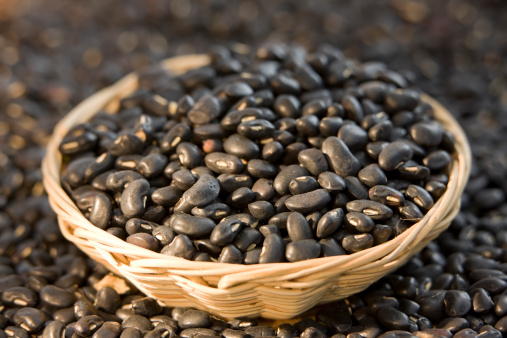 Black beans in a basket. Shallow depth of field. 