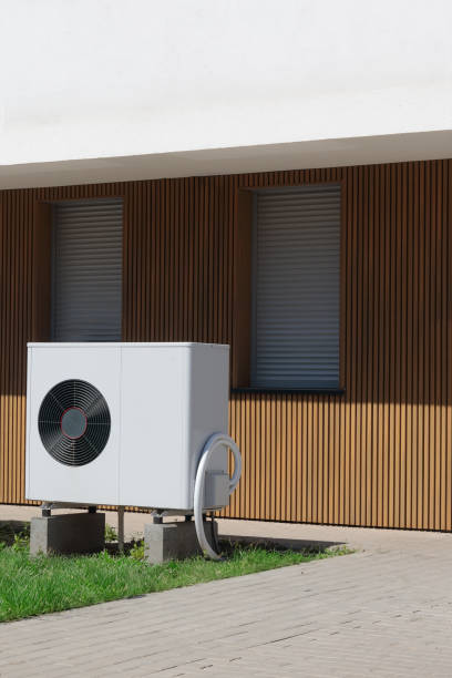 istock Air Source Heat Pump at Residential Pool House 1574394581