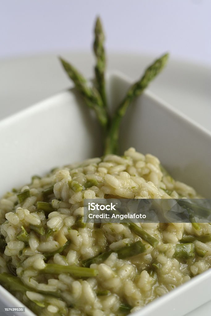 Risotto with Asparagus in a White Square Plate  Asparagus Stock Photo