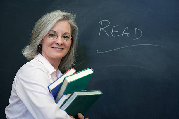 istock Teacher at the Blackboard (XXL) 157439610
