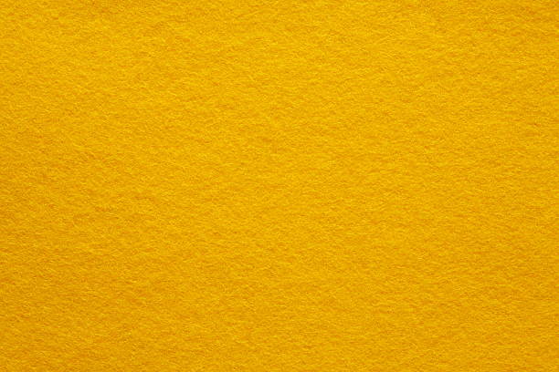 sintió fondo amarillo (parte de serie - felt fotografías e imágenes de stock