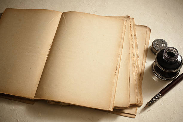 Pen and old book  ink well stock pictures, royalty-free photos & images