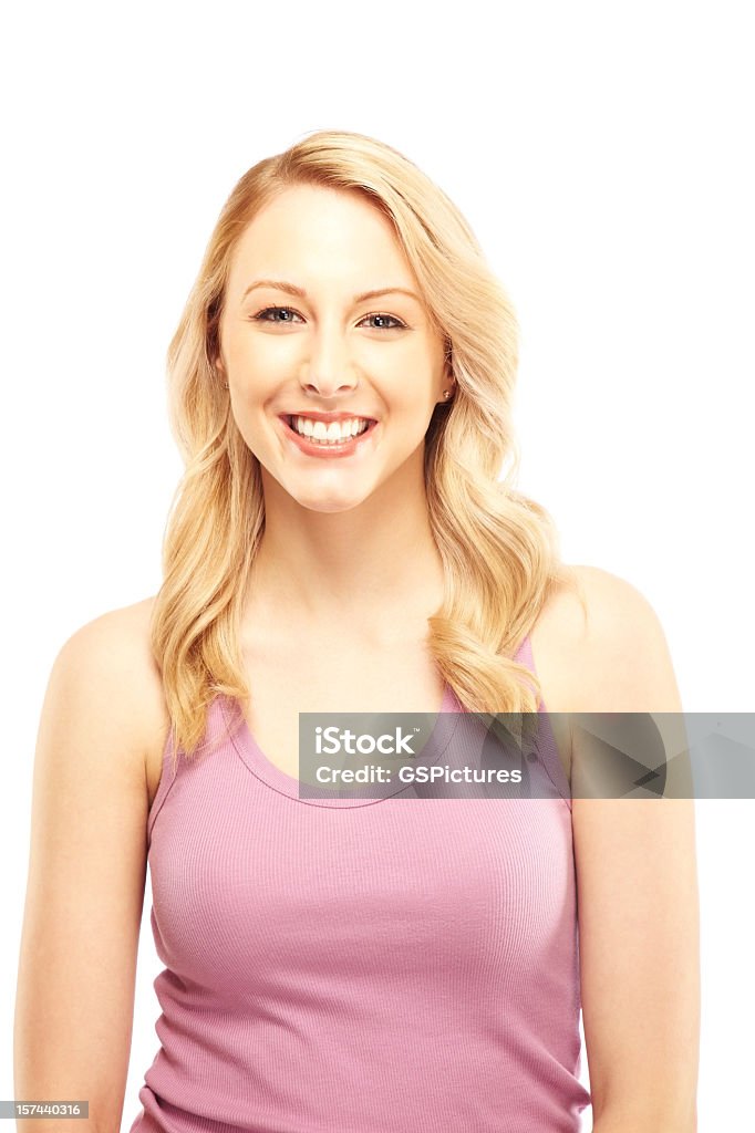 Attractive Young Blonde Woman Smiling at the Camera Beautiful young female smiling over white background 20-24 Years Stock Photo