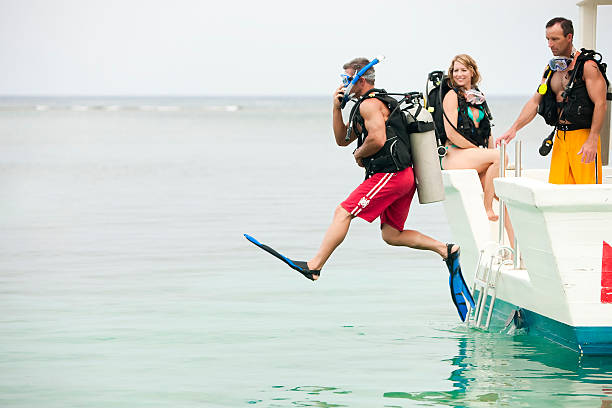 Vacation Lifestyles-Scuba Diver Jumping Off Boat