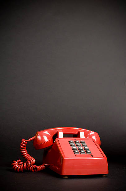 istock Vintage Red Phone on Black 157440397