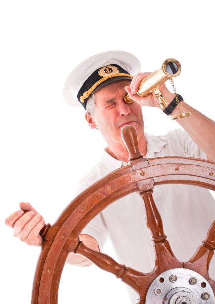 istock Senior sailor with telescope 157440453