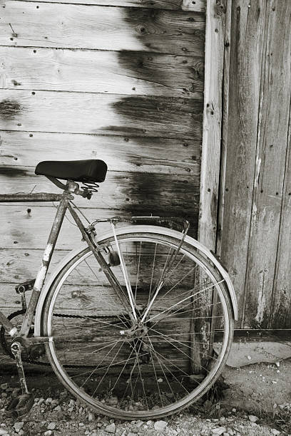 istock Old Bicycle Agains Wood Wall 157440561