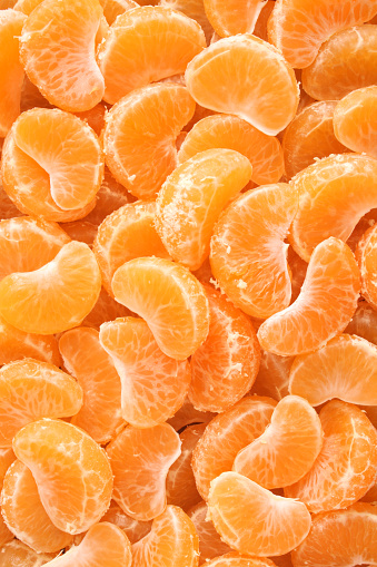 Top view of fresh tangerine wedges