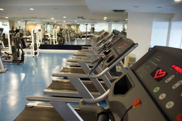 istock Exercise machines in gym, high angle view, differential focus 157440686