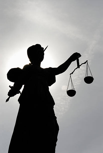Low angle view of a silhouette of the statue Justitia