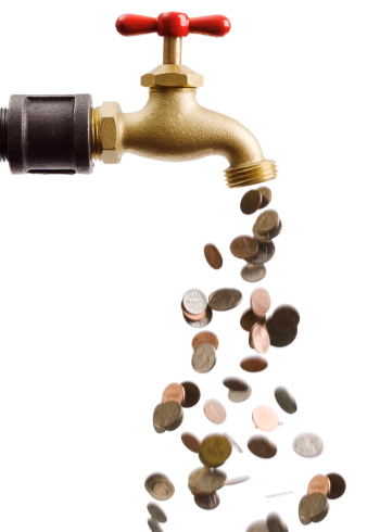 Coins flowing down from a faucet, as in the common phase \