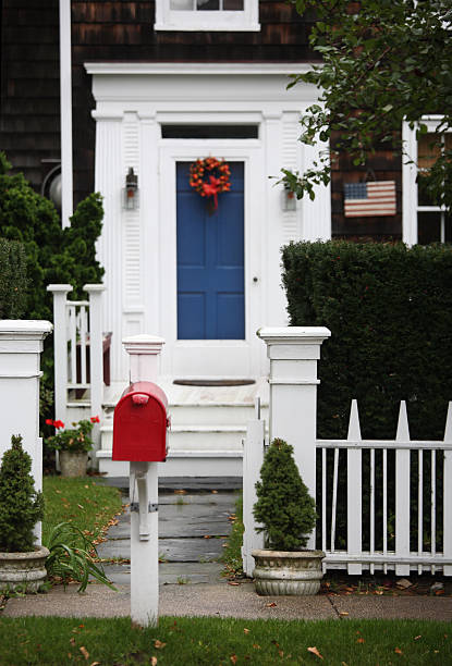 Patriotic yard in red white and blue  blue house red door stock pictures, royalty-free photos & images