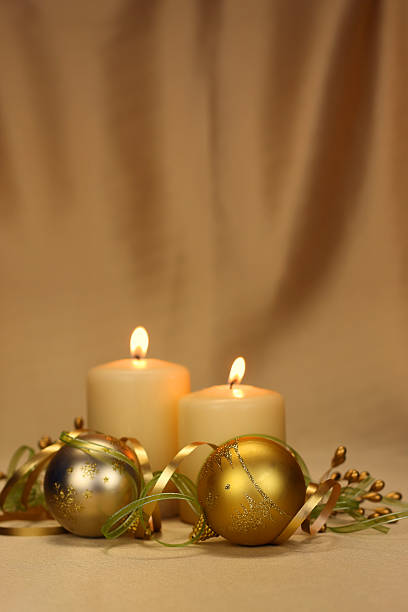 istock Silver and gold Christmas baubles on a golden backdrop 157441293